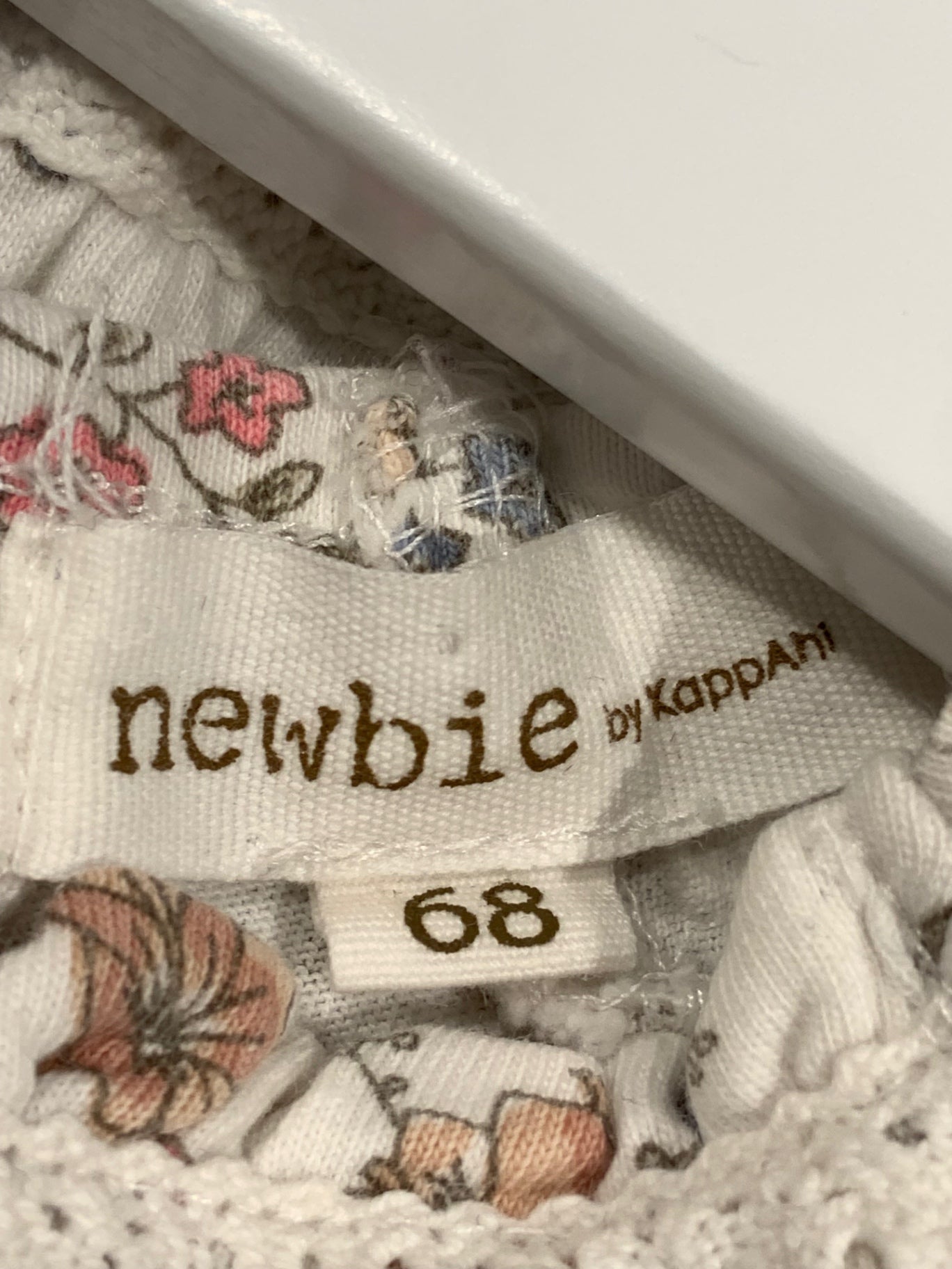 K newbie klänning blommig vit 68