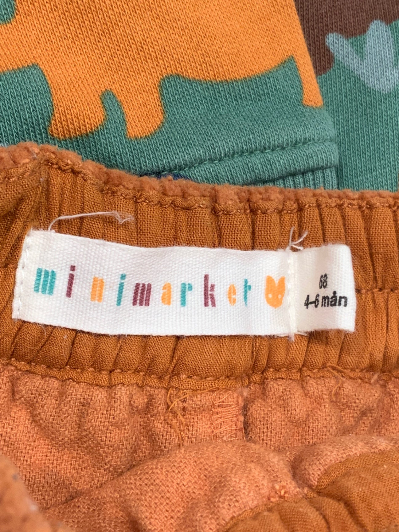 S Minimarket Byxor 68 orange